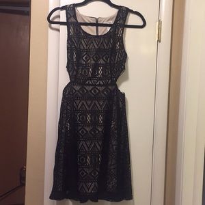 Black & tan dress with side cut outs